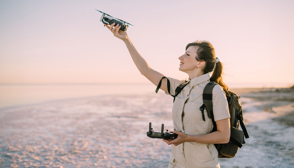 how much do drone photos cost - woman with drone